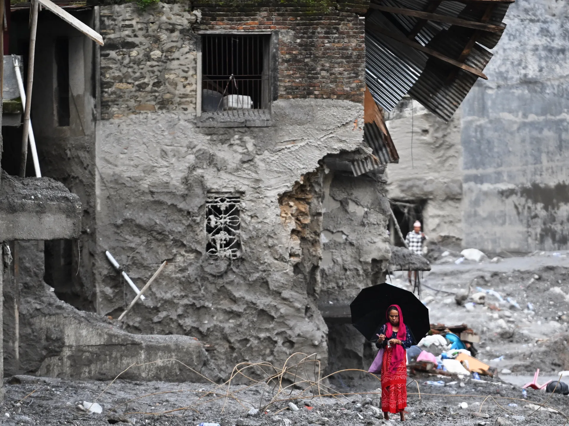 Death toll from devastating floods in China and Nepal surpasses 1,000