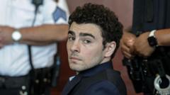 Mangione admits killing healthcare CEO and pleads guilty to federal charges