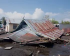 Rescue teams search for survivors in Indonesia after powerful earthquake