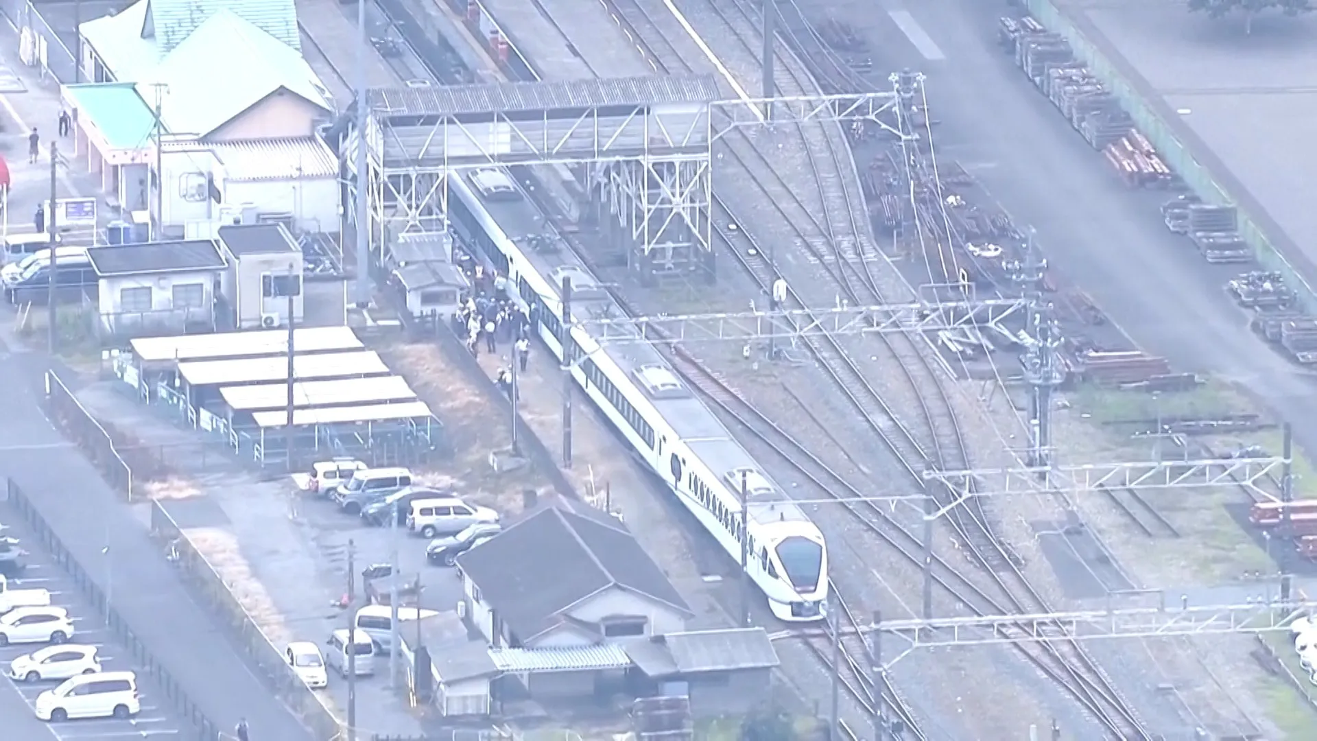 Four railway workers killed by express train at station in Japan