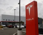 Tesla beats earnings projections after Musk floats SpaceX merger plan