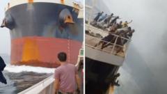 Watch: Dramatic moment a cargo ship crashes into another vessel