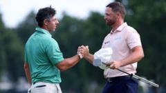 Clark holds off McIlroy fightback to win BMW Championship