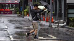 Hundreds of flights cancelled as Typhoon Champi shuts Taiwan