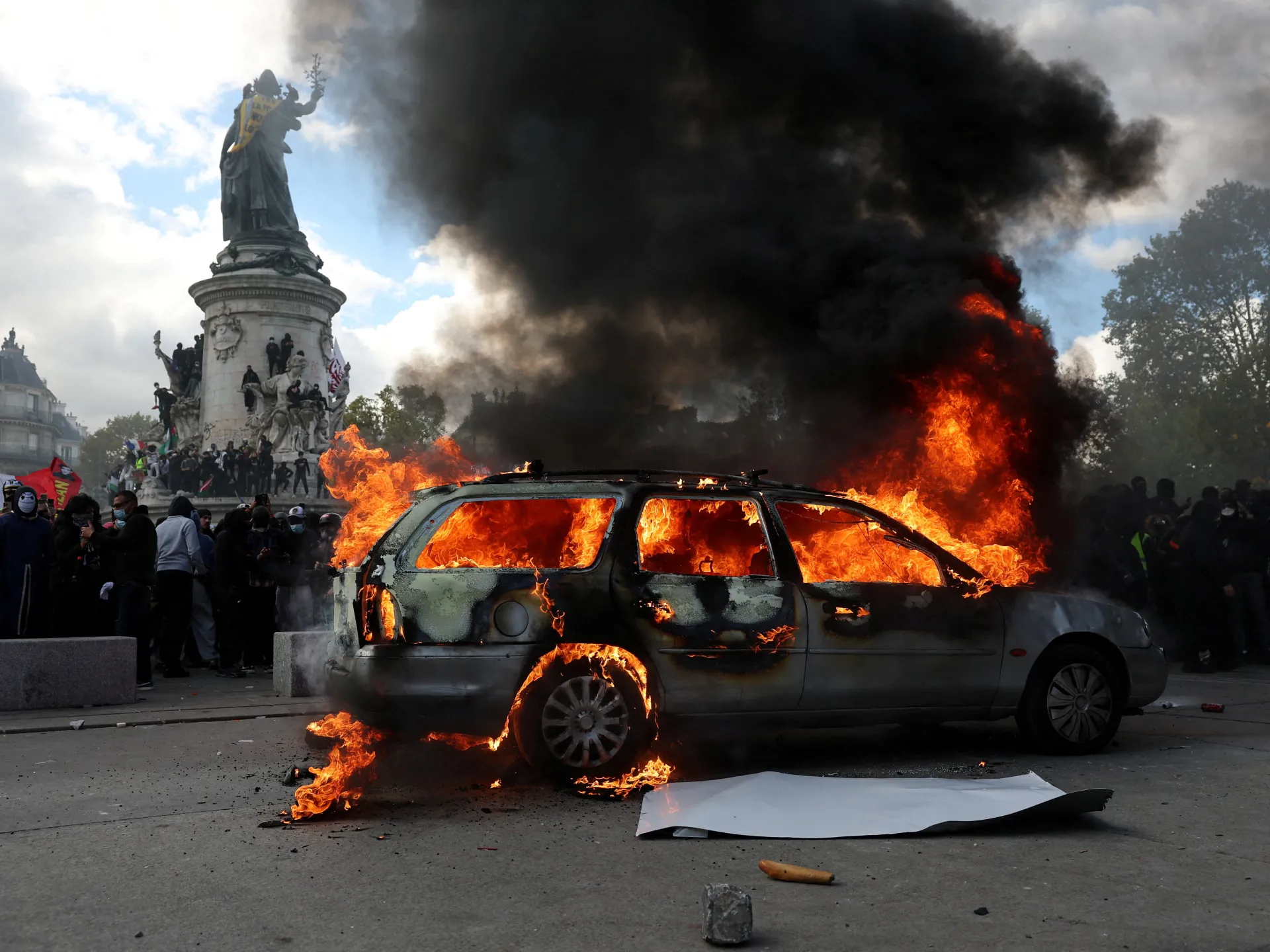 Photos: Protests across France spiral into looting, blazes and clashes