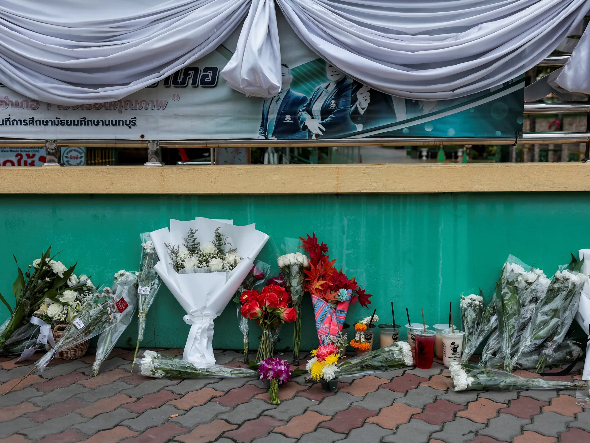 Families retrieve bodies after deadly shooting rampage outside Bangkok
