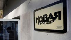 Prominent Russian newspaper shuts down under pressure from authorities