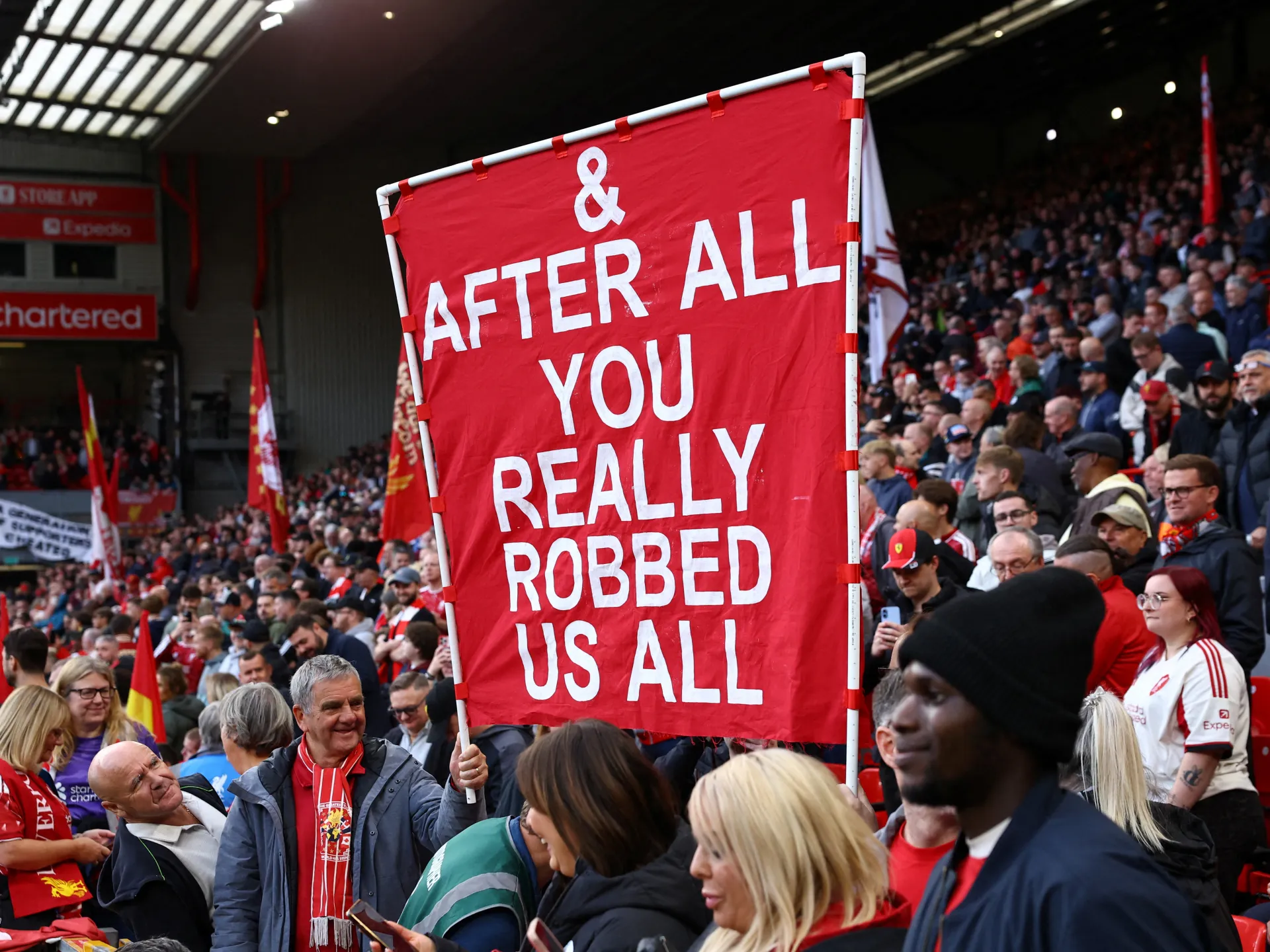 Which banners did Liverpool fans display at Anfield against Man City?