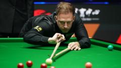 Trump thrashes Zhao to reach last four of British Open