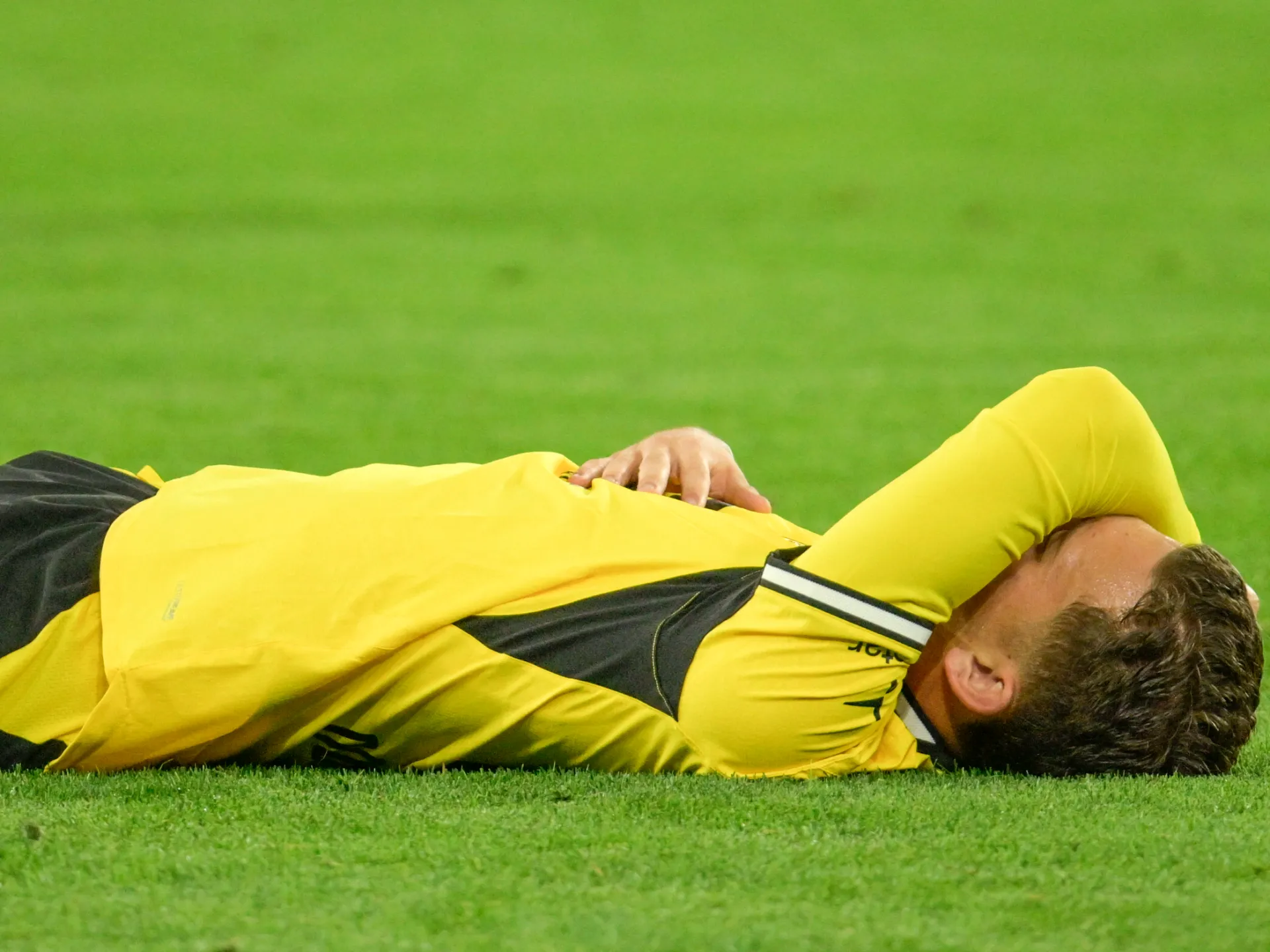 Dortmund’s Karetsas hospitalised after collapsing in Champions League match