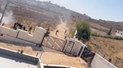 Israeli settlers besieging Palestinian families in West Bank village
