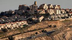 Israel opens up tenders for controversial West Bank settlement project