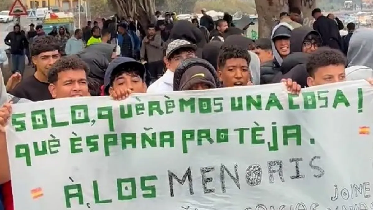 Migrant children protest after police clear beach camp in Ceuta